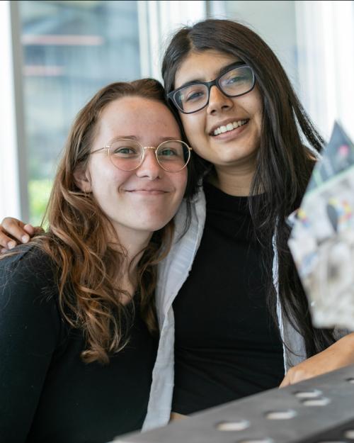 		two girls hugging
	