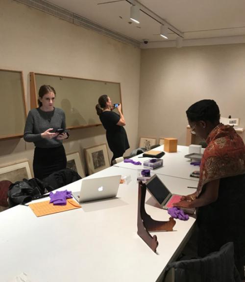 		 Students working in conference room
	