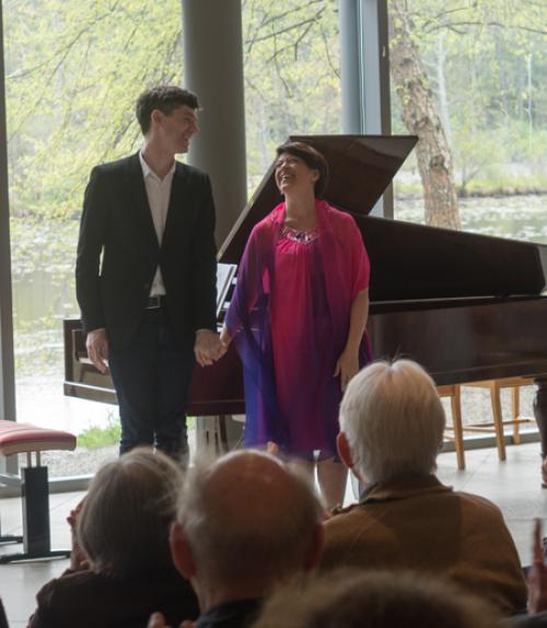 		 Miri Yampolsky and Xak Bjerken posing after performance
	