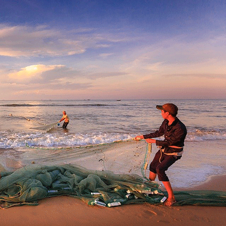 		 Man fishing with net
	