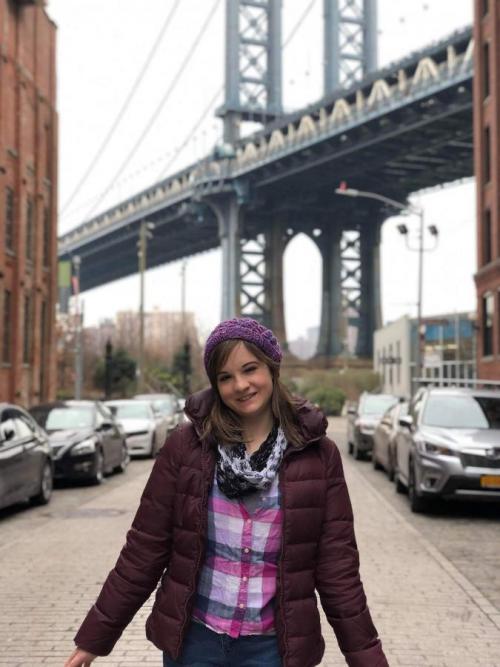 woman near NYC bridge