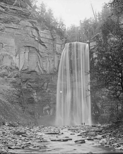 		Historical black and white photo of a large waterfall
	