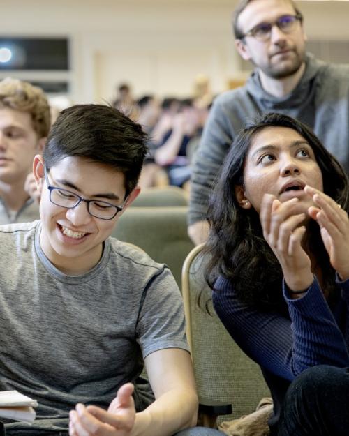 		People sitting in a college classroom
	