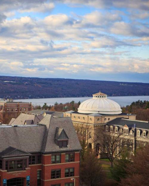 		Campus buildings, cloudy sky, lake
	