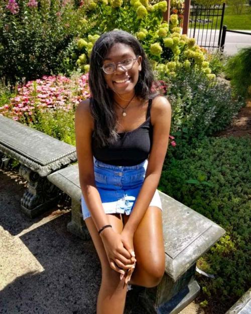 girl sitting on bench