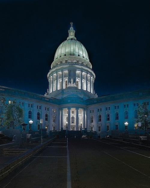 		White domed building lit up at night
	