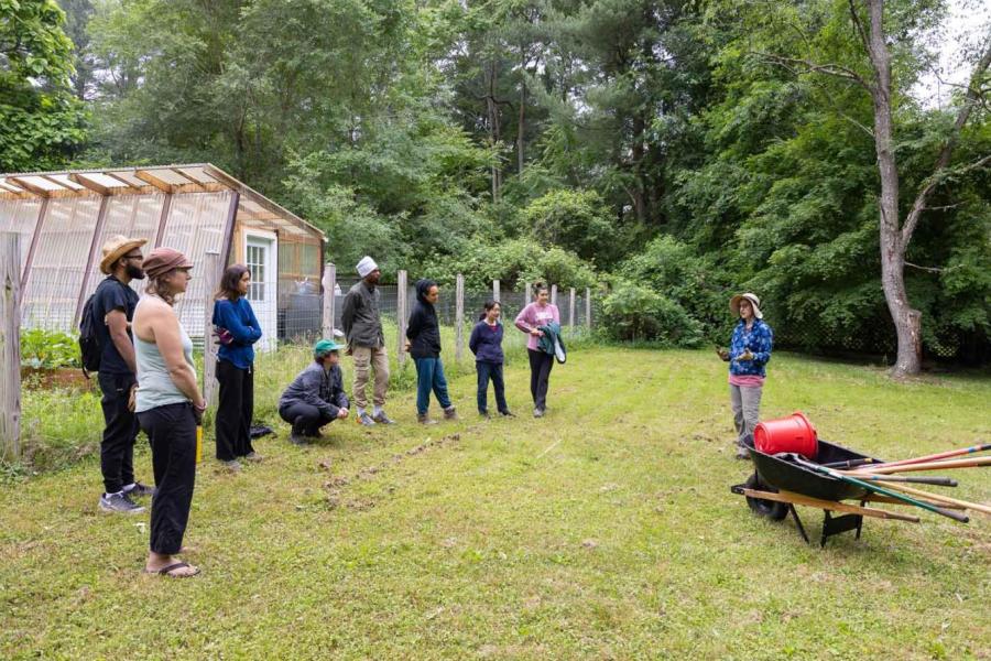 person teaching a group of people