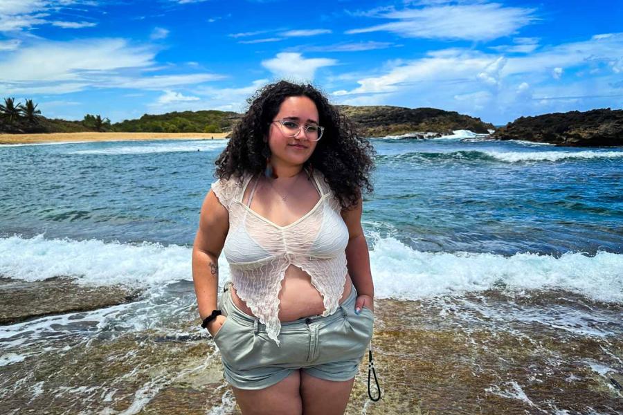 person standing near ocean