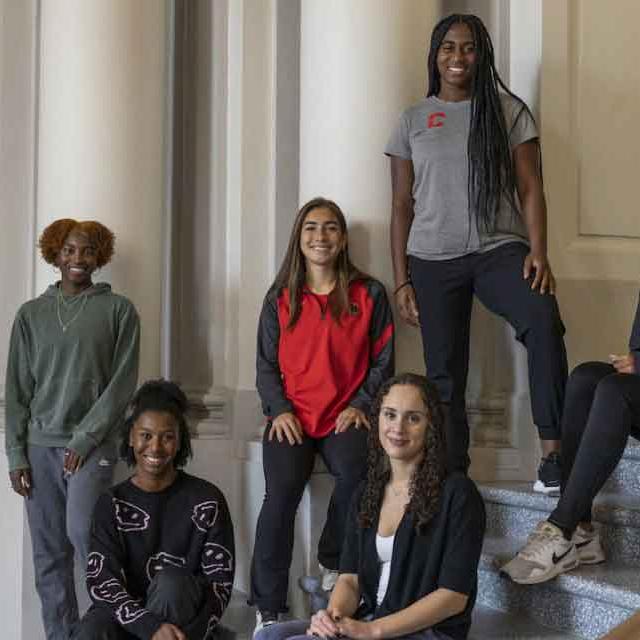 six women on steps of Goldwin Smith Hall