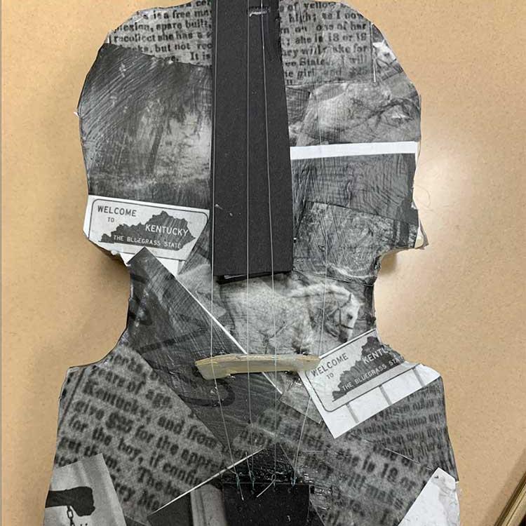 Collage of black and white text fragments shaped like a fiddle