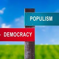 		Sign showing Populism going one way and democracy the other
	