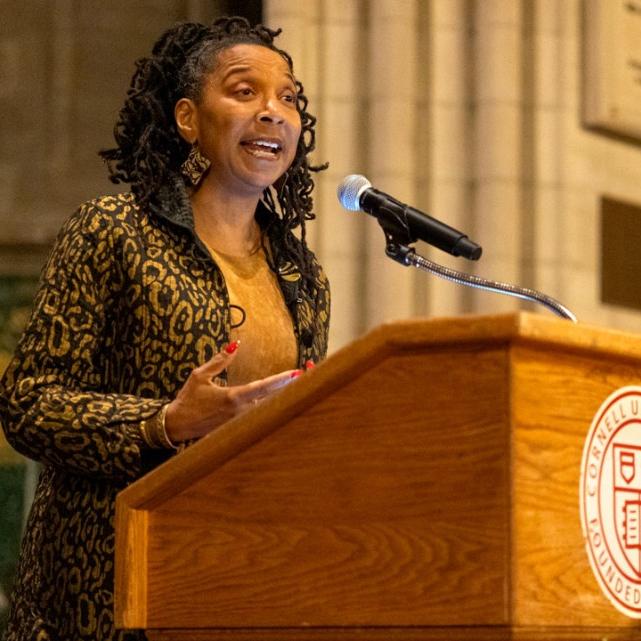 Person speaking at a podium