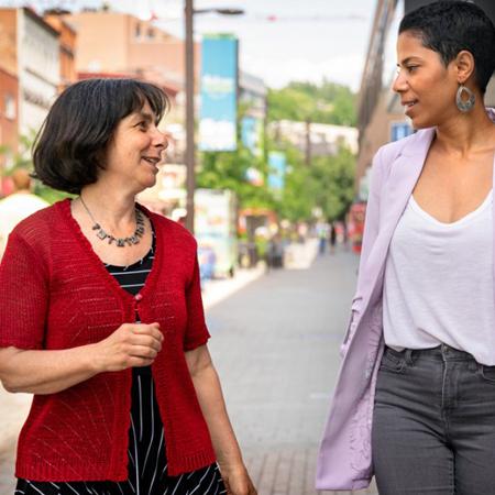 Two woman walking