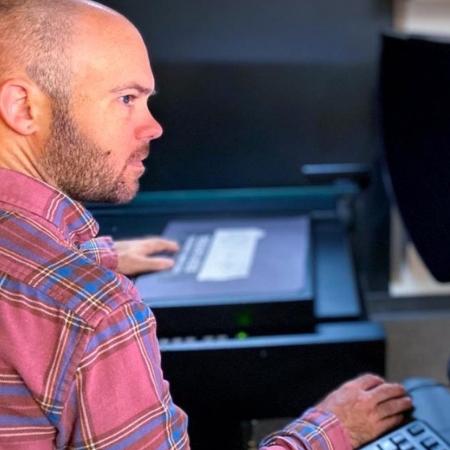 Researcher working on a computer