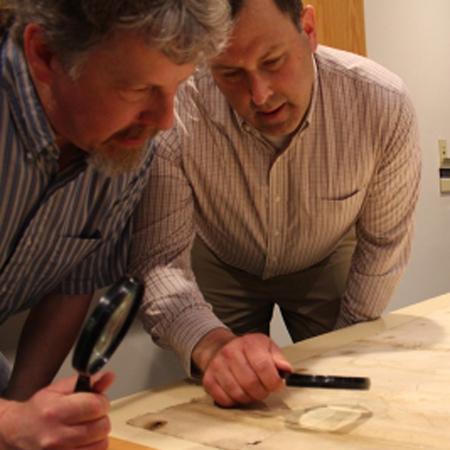  Two men looking at a map