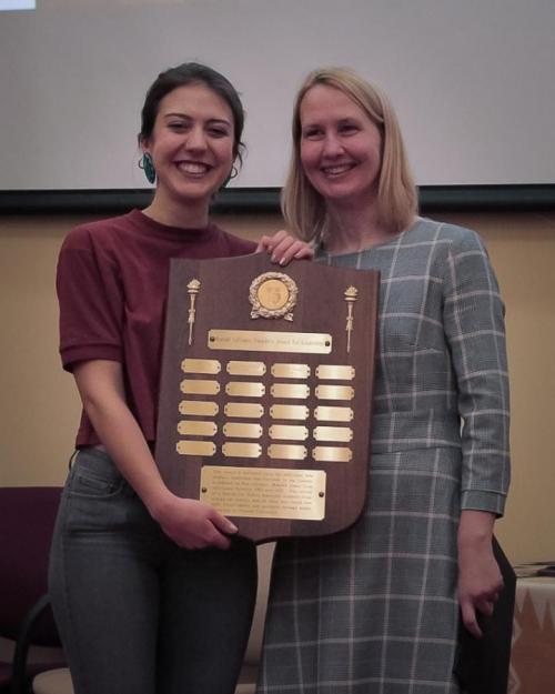 Girl receiving award