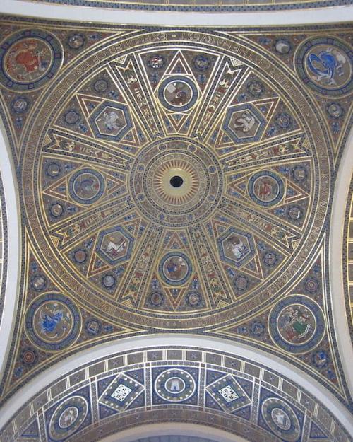 Geometrical ceiling design shining with gold