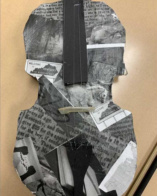 Collage of black and white text fragments shaped like a fiddle