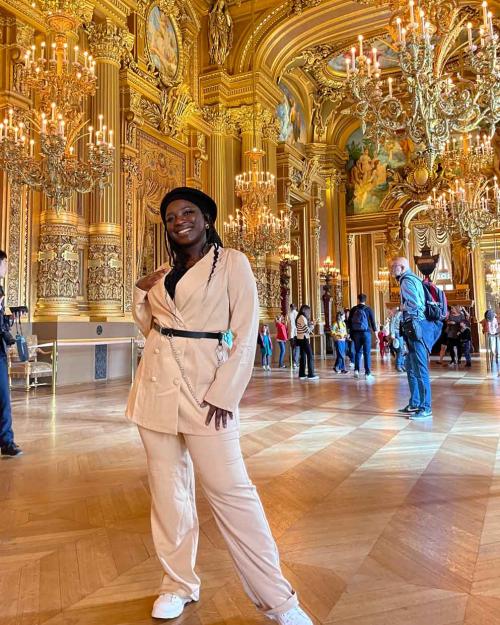 woman in golden room