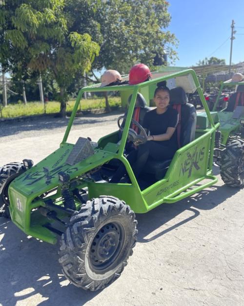 woman sitting in All terrain vehicle