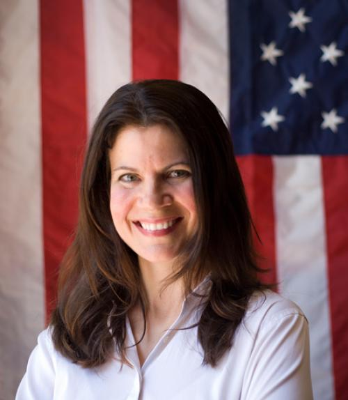  Researcher standing infront of American flag