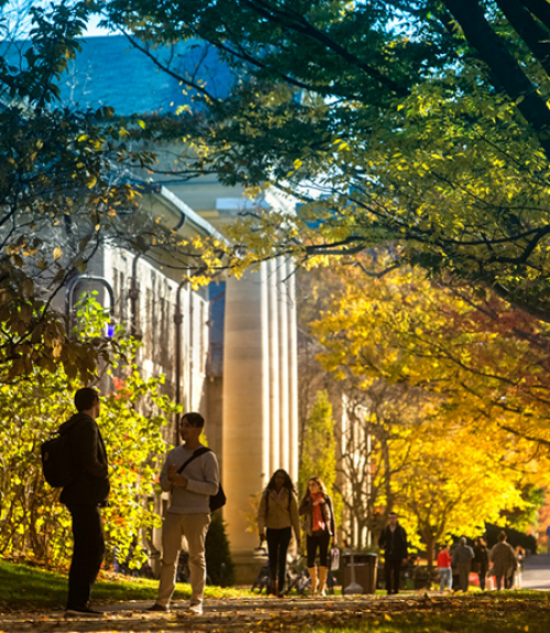  people walking down the arts quad