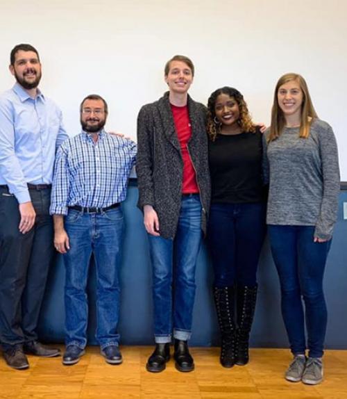  Five people, smiling