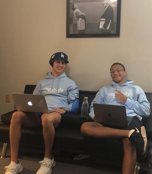  Two students working on computers