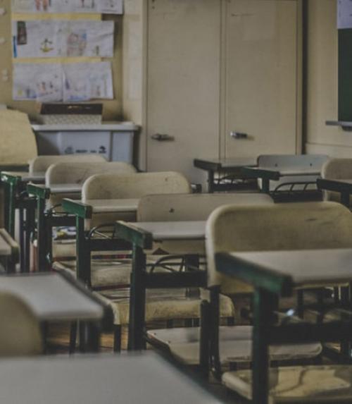  desks in empty classroom