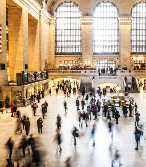  Crowds rushing through a station, photo by Nicolai Berntsen on Unsplash