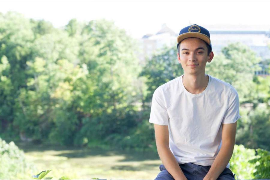 boy sitting outside 