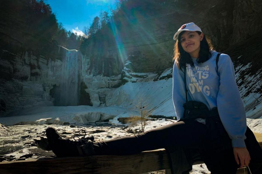 girl by waterfall