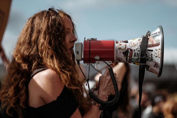 Person speaking into a megaphone